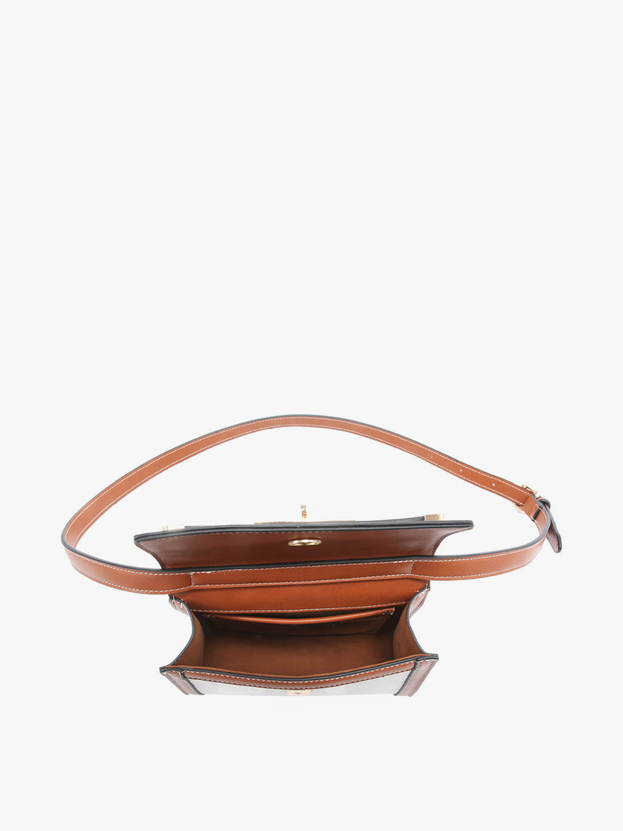 Brown leather handbag with a strap on a white background