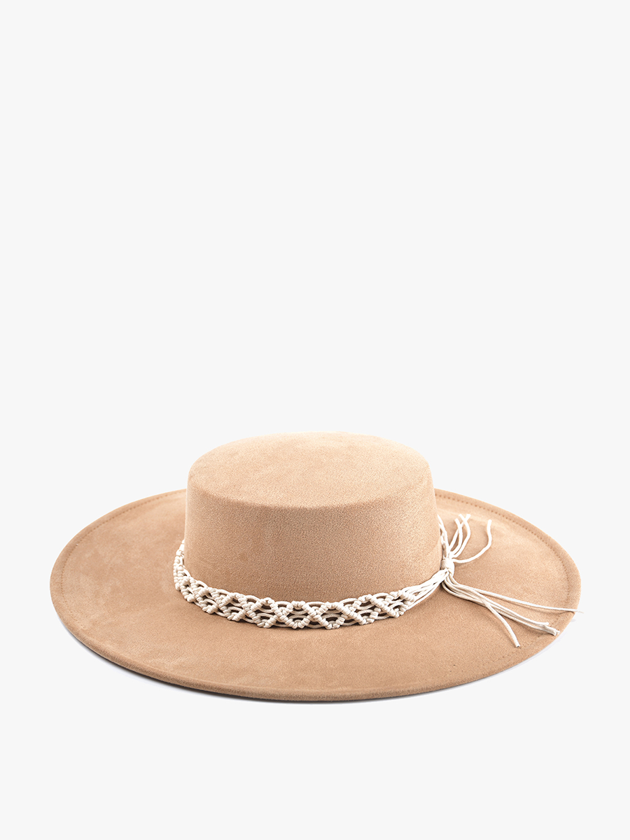 Beige hat with a decorative white band on a white background