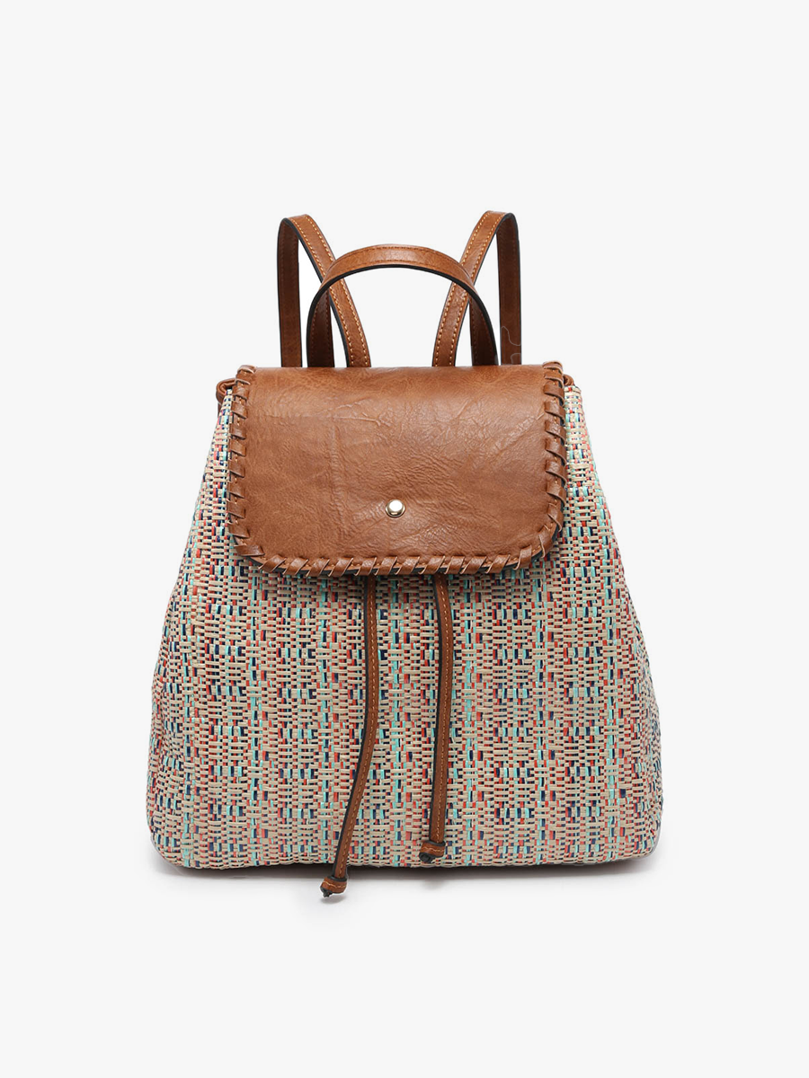 Backpack with brown leather flap and patterned body on a white background