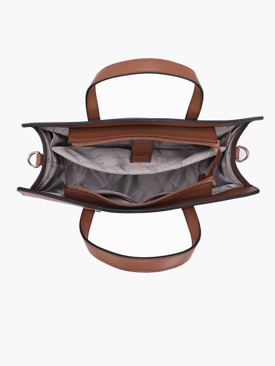 Brown leather handbag with open front compartment on a white background
